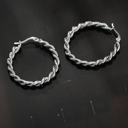 Boucles d'oreilles créoles torsadées SUKI en argent