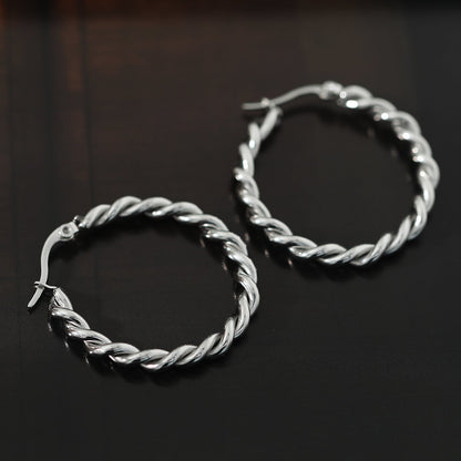 Boucles d'oreilles créoles torsadées SUKI en argent