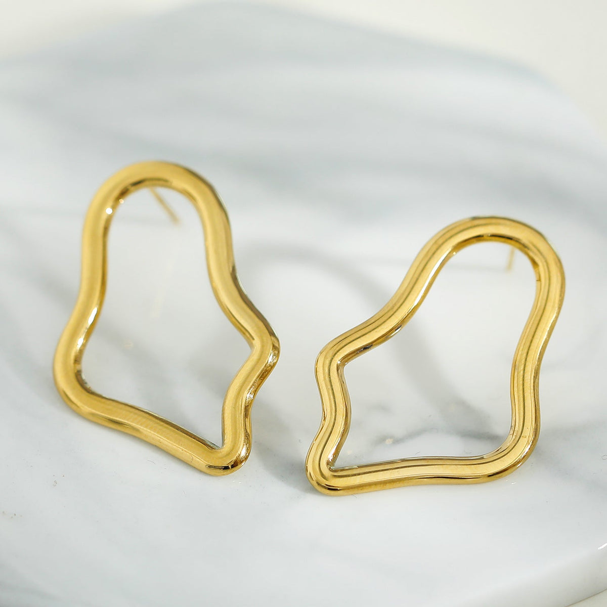 Boucles d'oreilles créoles irrégulières MARTINA en or