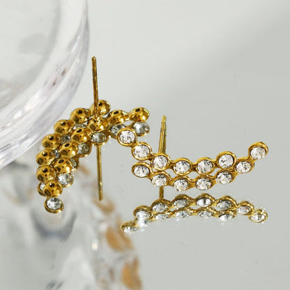 Boucles d'oreilles clous KIANI Duo Courbes Silhouettes en Zirconium