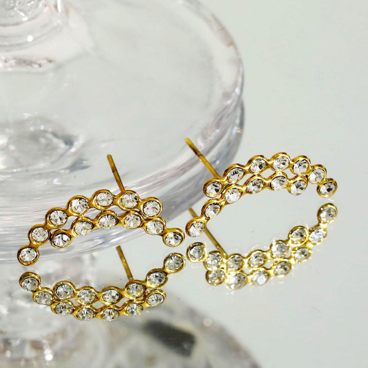 Boucles d'oreilles clous KIANI Duo Courbes Silhouettes en Zirconium