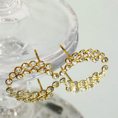 Boucles d'oreilles clous KIANI Duo Courbes Silhouettes en Zirconium