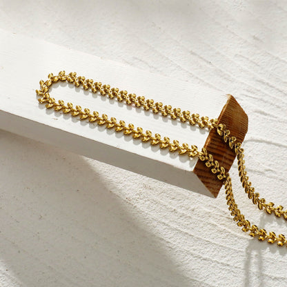 FANIA : Collier Chaîne Audacieuse à Motifs Végétaux