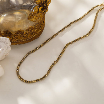 MEDILNA : Collier ras du cou deux tons or et noir avec perles en cristal