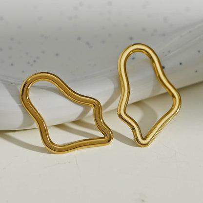Boucles d'oreilles créoles irrégulières MARTINA en or