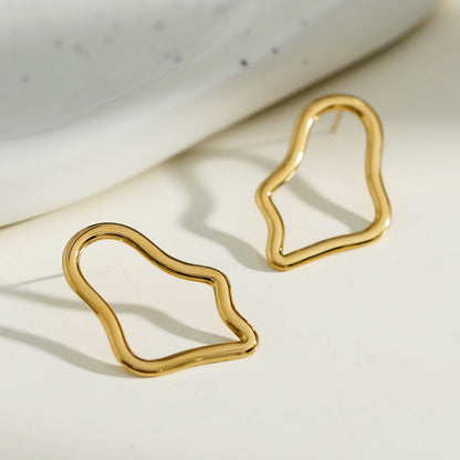 Boucles d'oreilles créoles irrégulières MARTINA en or