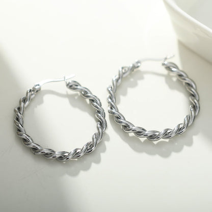 Boucles d'oreilles créoles torsadées SUKI en argent