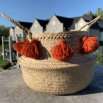 Porta - Panier en jonc de mer avec pompons oranges