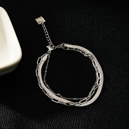 REINEDA: Bracelet triple en or blanc (ton argenté)