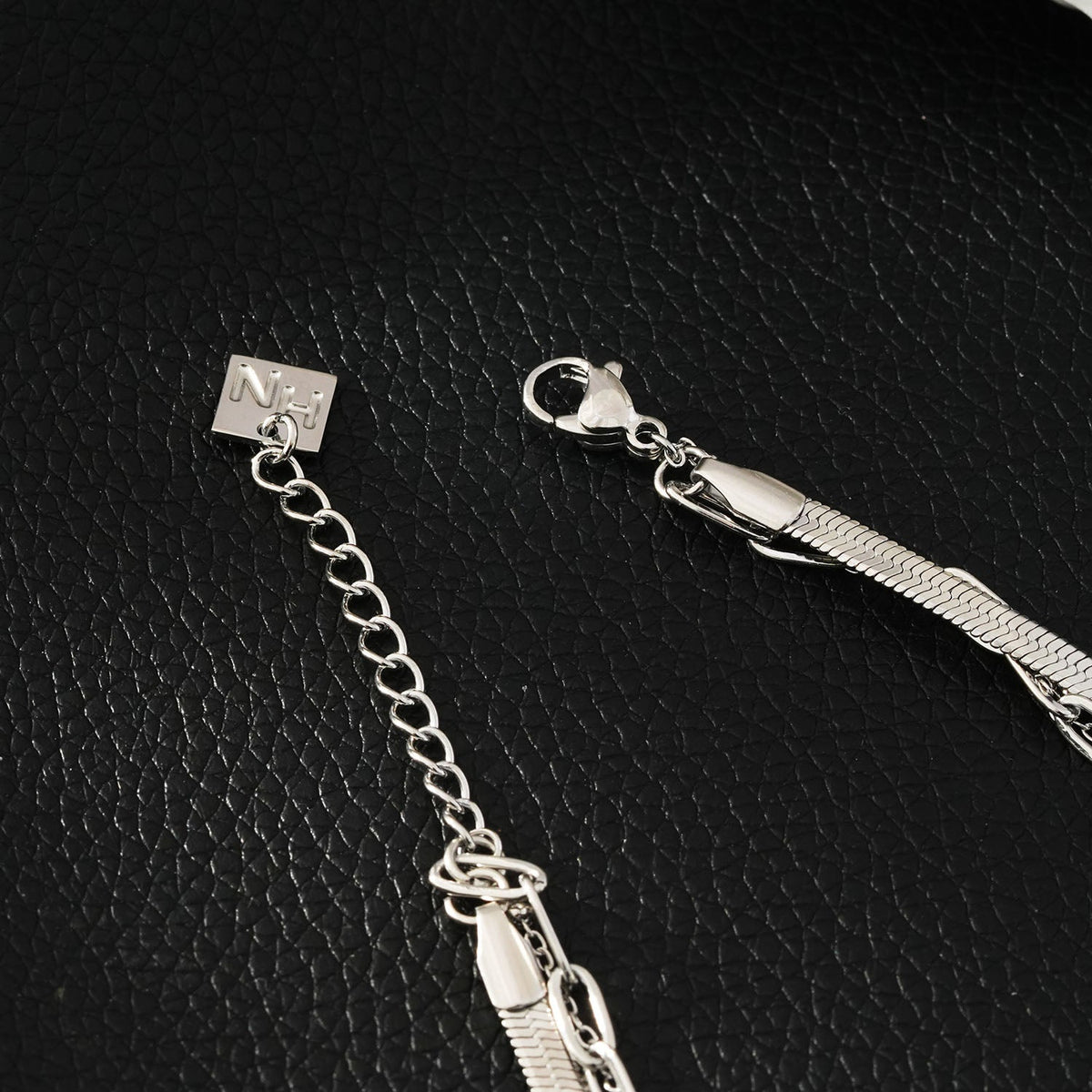 REINEDA: Bracelet triple en or blanc (ton argenté)
