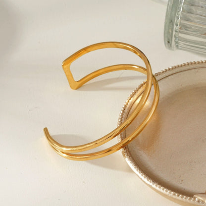 ROSARA Gold : Bracelet double rang chic et minimaliste