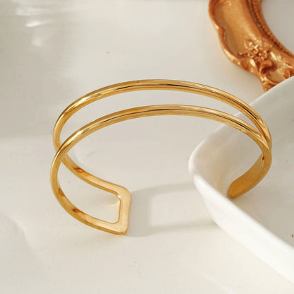 ROSARA Gold : Bracelet double rang chic et minimaliste