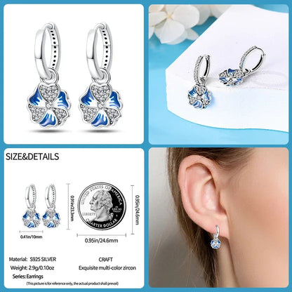 Boucles d'oreilles créoles en argent sterling avec breloque fleur bleue élégante