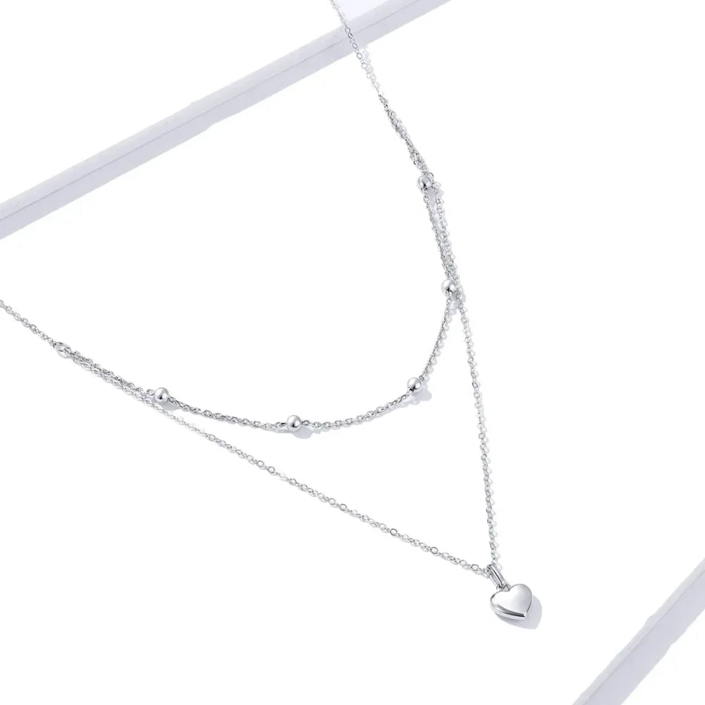 Collier ras de cou avec pendentif double cœur en argent sterling 925