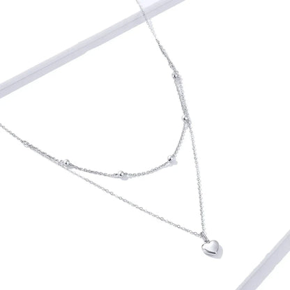 Collier ras de cou avec pendentif double cœur en argent sterling 925