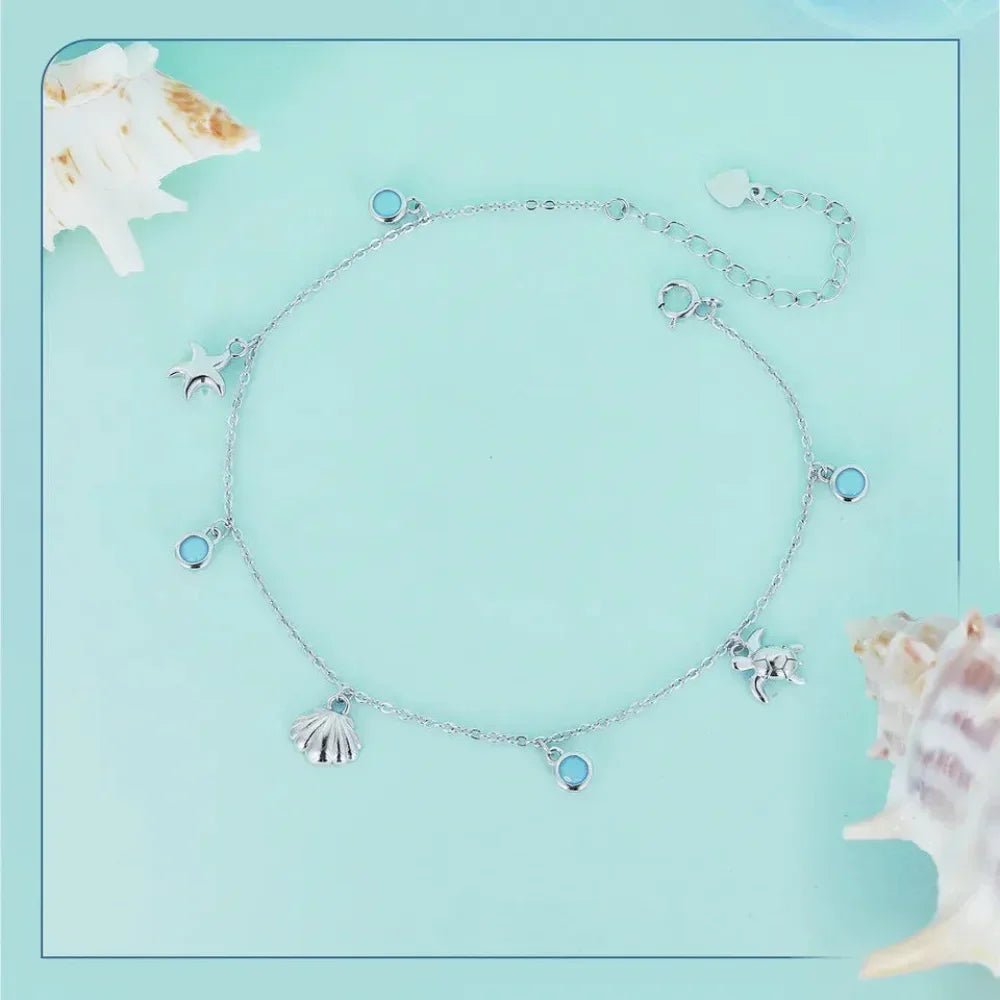 Le jonc de cheville Tropical Opal Sea Star & Shell