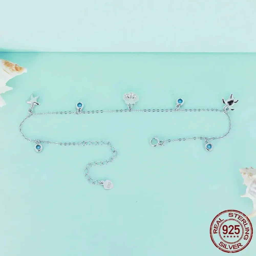 Le jonc de cheville Tropical Opal Sea Star & Shell
