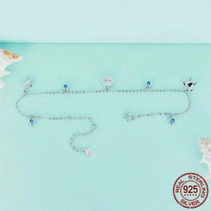 Le jonc de cheville Tropical Opal Sea Star & Shell