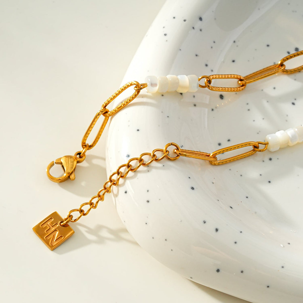 SEDONA Bracelet: Natural Shell & Gold Paper-Clip Chain Combination with an Art Deco Pendent