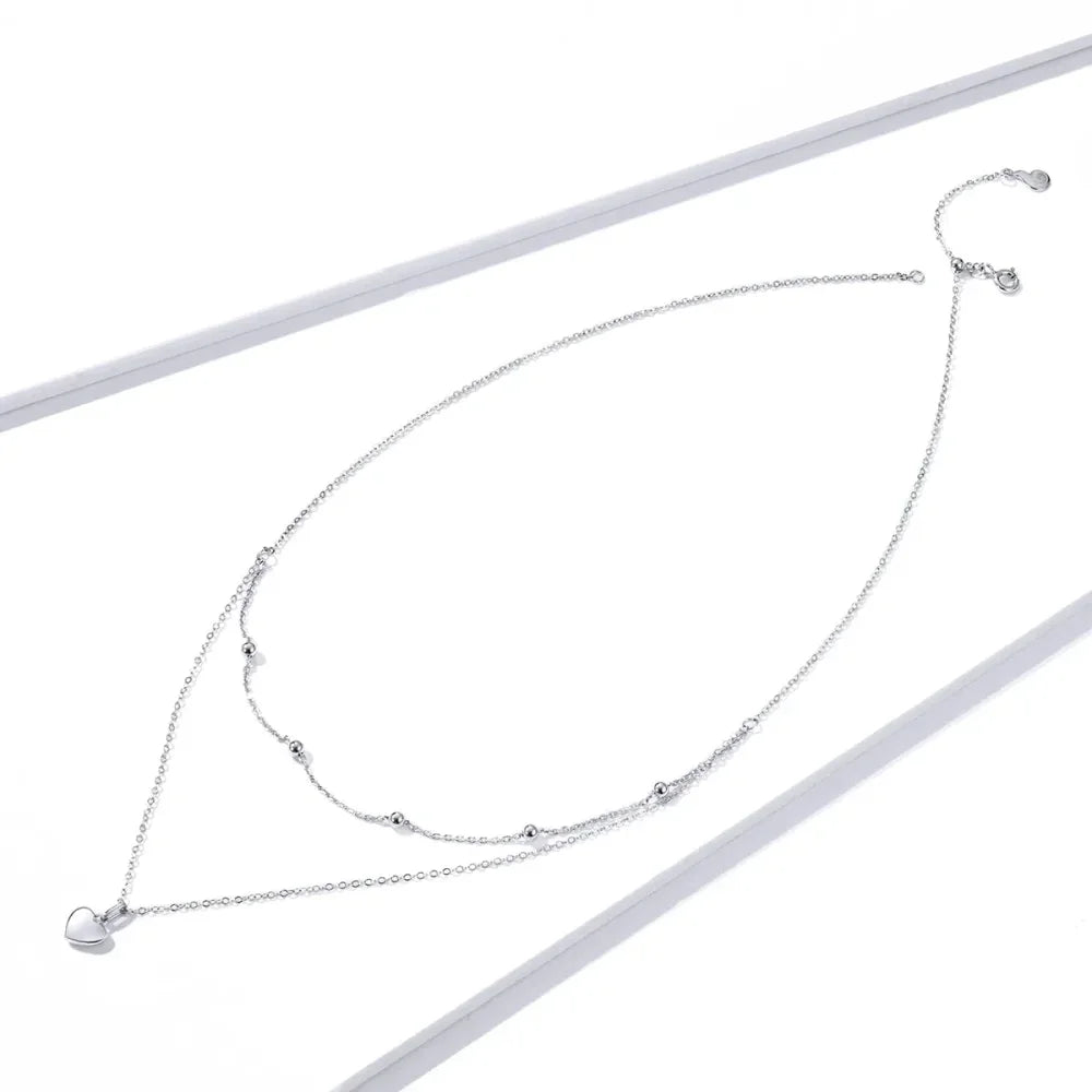 Collier ras de cou avec pendentif double cœur en argent sterling 925