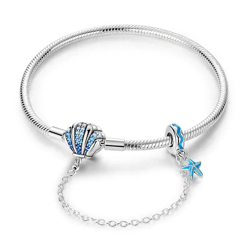 Bracelet breloque coquillage en argent sterling avec dégradé de zircones cubiques bleues
