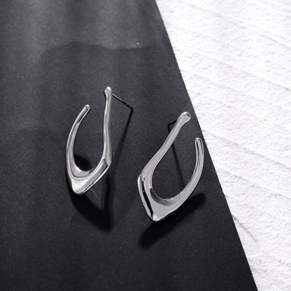 Boucles d'oreilles créoles forme abstraite TARAJI en argent