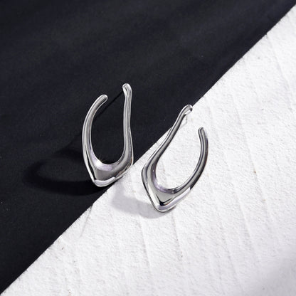 Boucles d'oreilles créoles forme abstraite TARAJI en argent