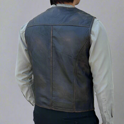 Gilet en cuir de mouton pour homme. Fermeture classique boutonnée et poches avant