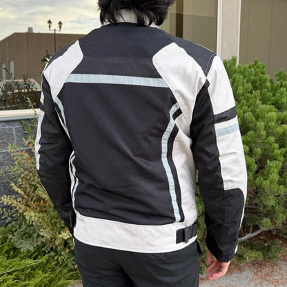 Blouson moto textile pour homme. Protections, bandes réfléchissantes et poches multiples