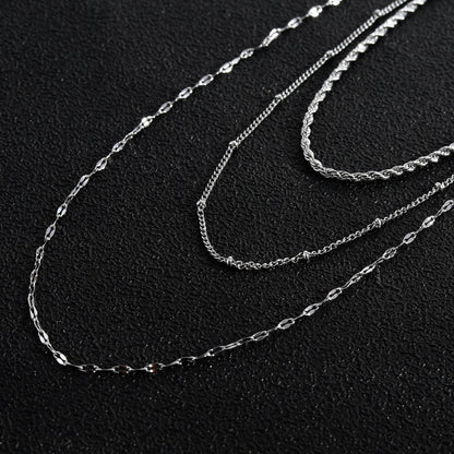 Collier ZURI à triple chaîne en argent